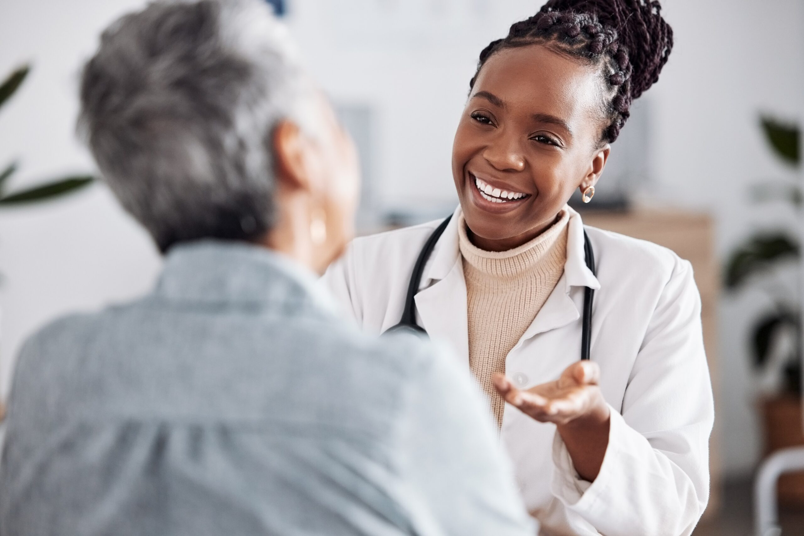 Doctor smiling at patient